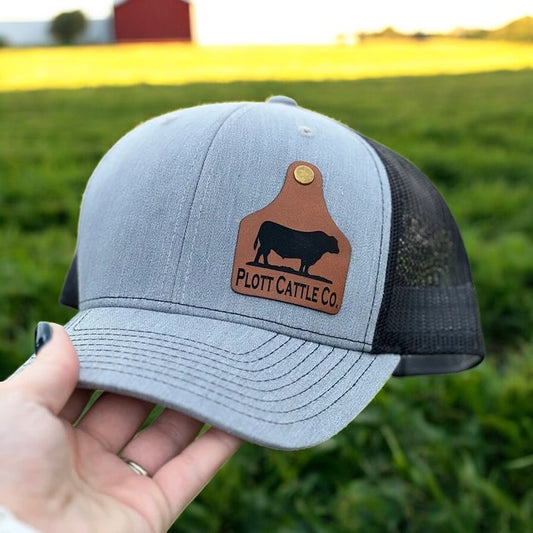 grey hat with custom cattle tag