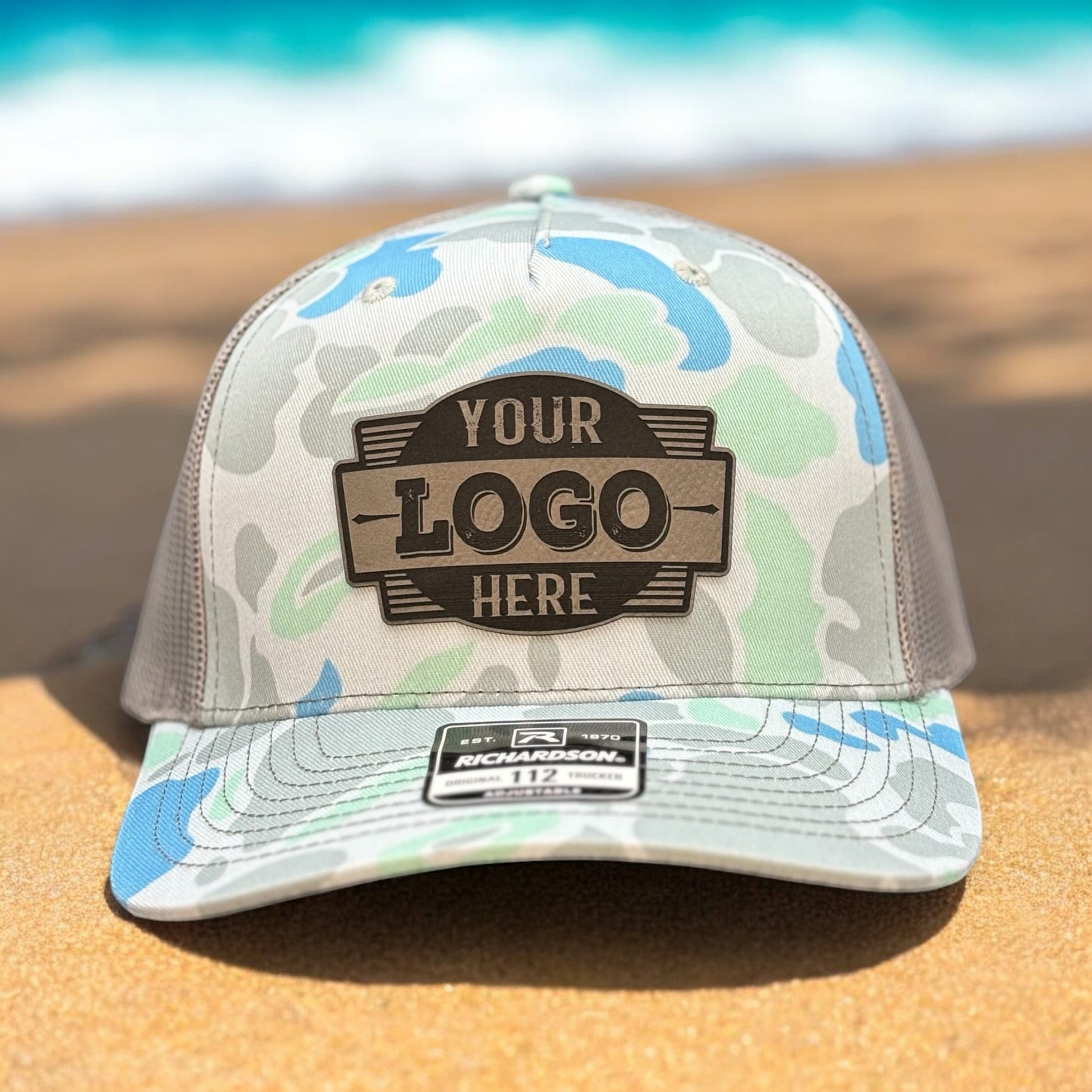 Camo hat with a custom patch outdoors