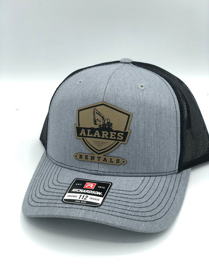 grey hat with a logo on patch