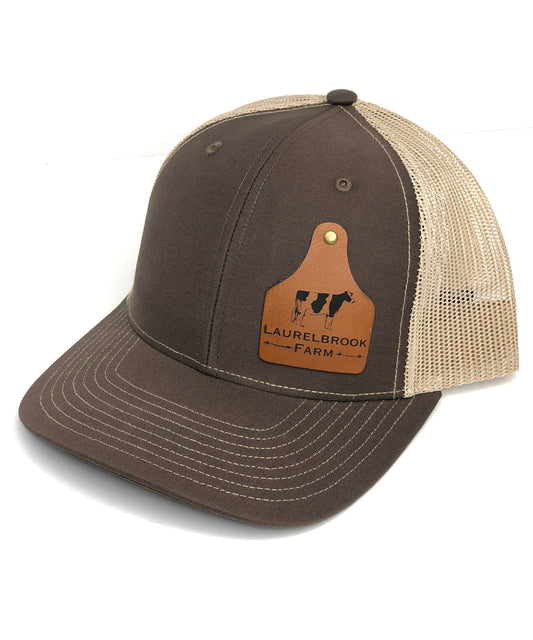 brown hat with custom cattle tag patch