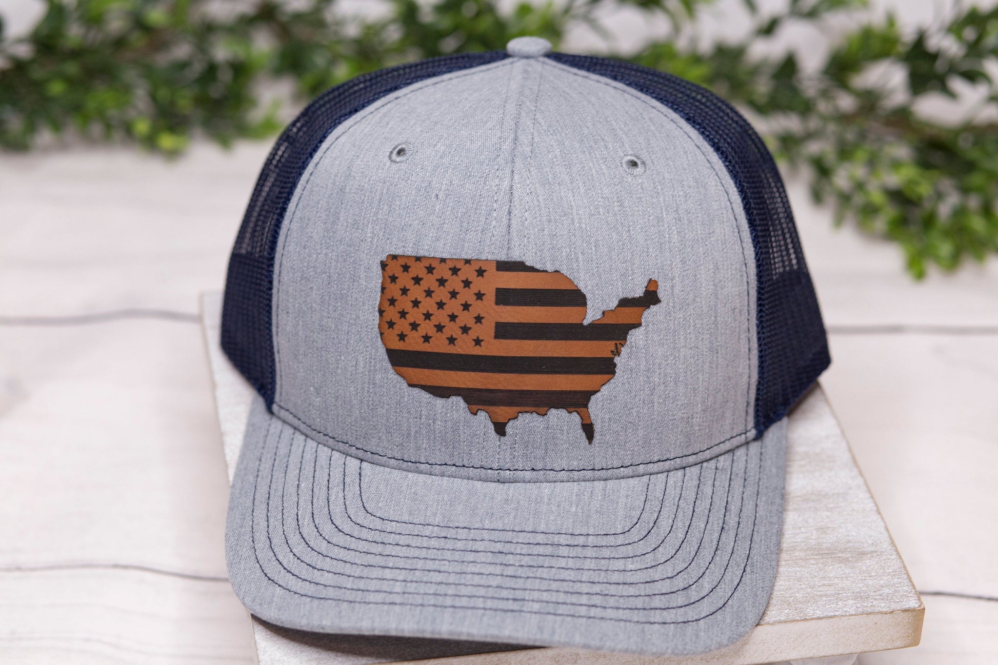 grey hat with an American Flag patch front view