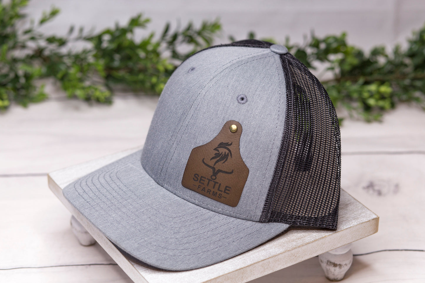 grey hat with custom cattle tag patch